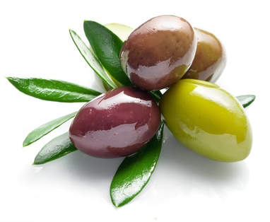 Olives with leaves on a white background.